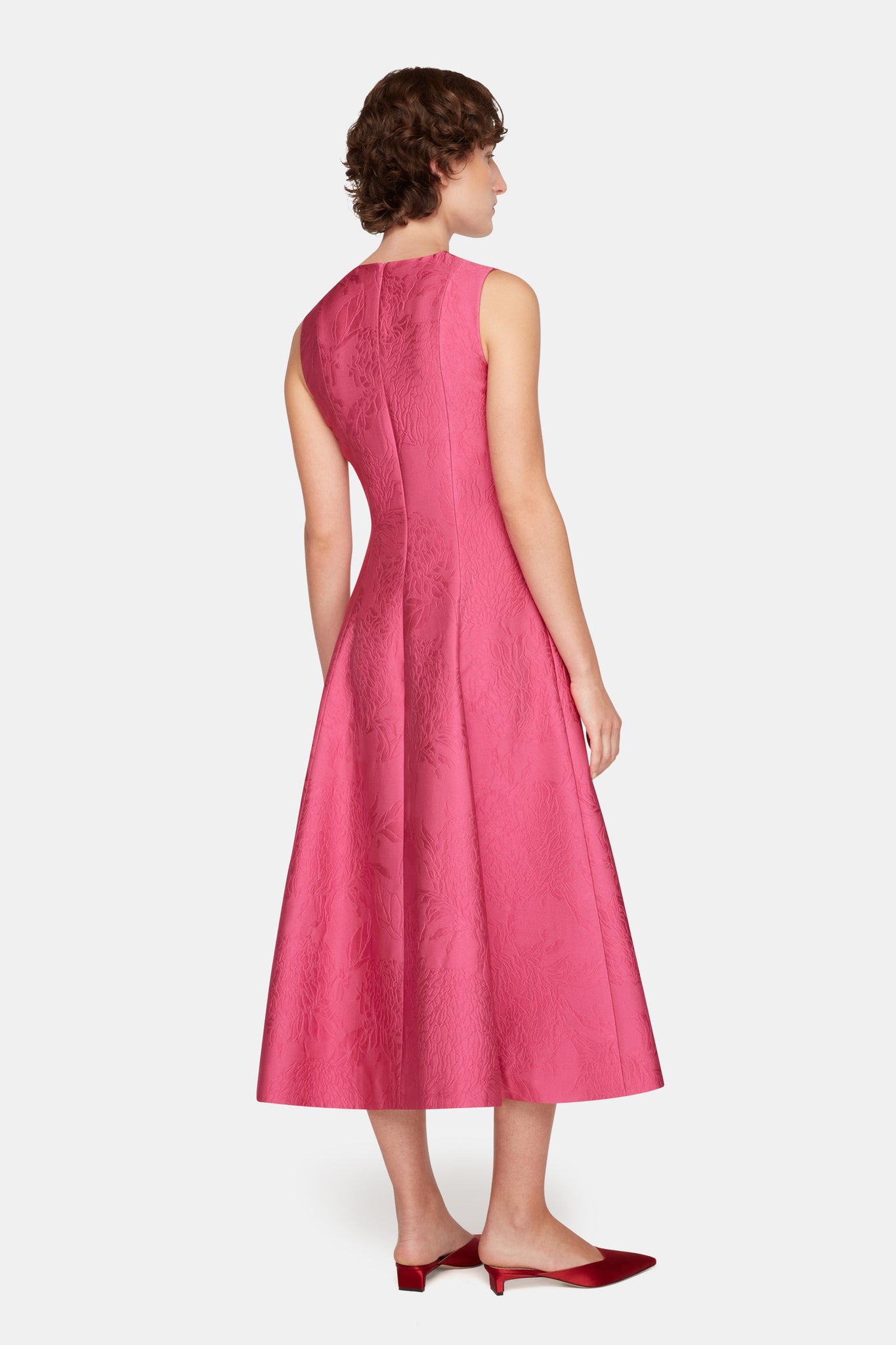 Mara Dress In Hot Pink Embossed Cloque model full length back shot | Emilia Wickstead