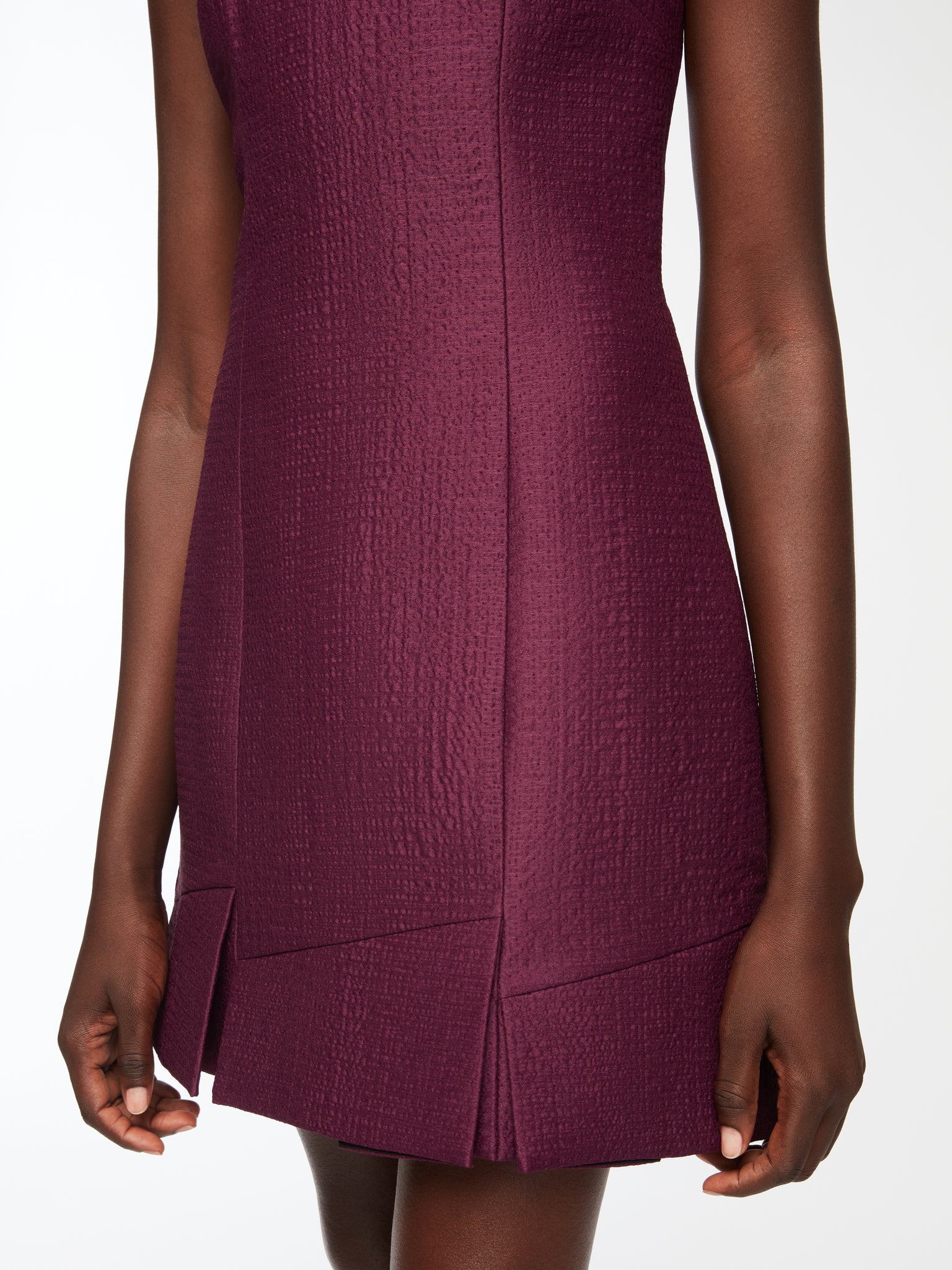 Petronella Dress In Plum Needle Punch Satin Model Detail Shot | Emilia Wickstead