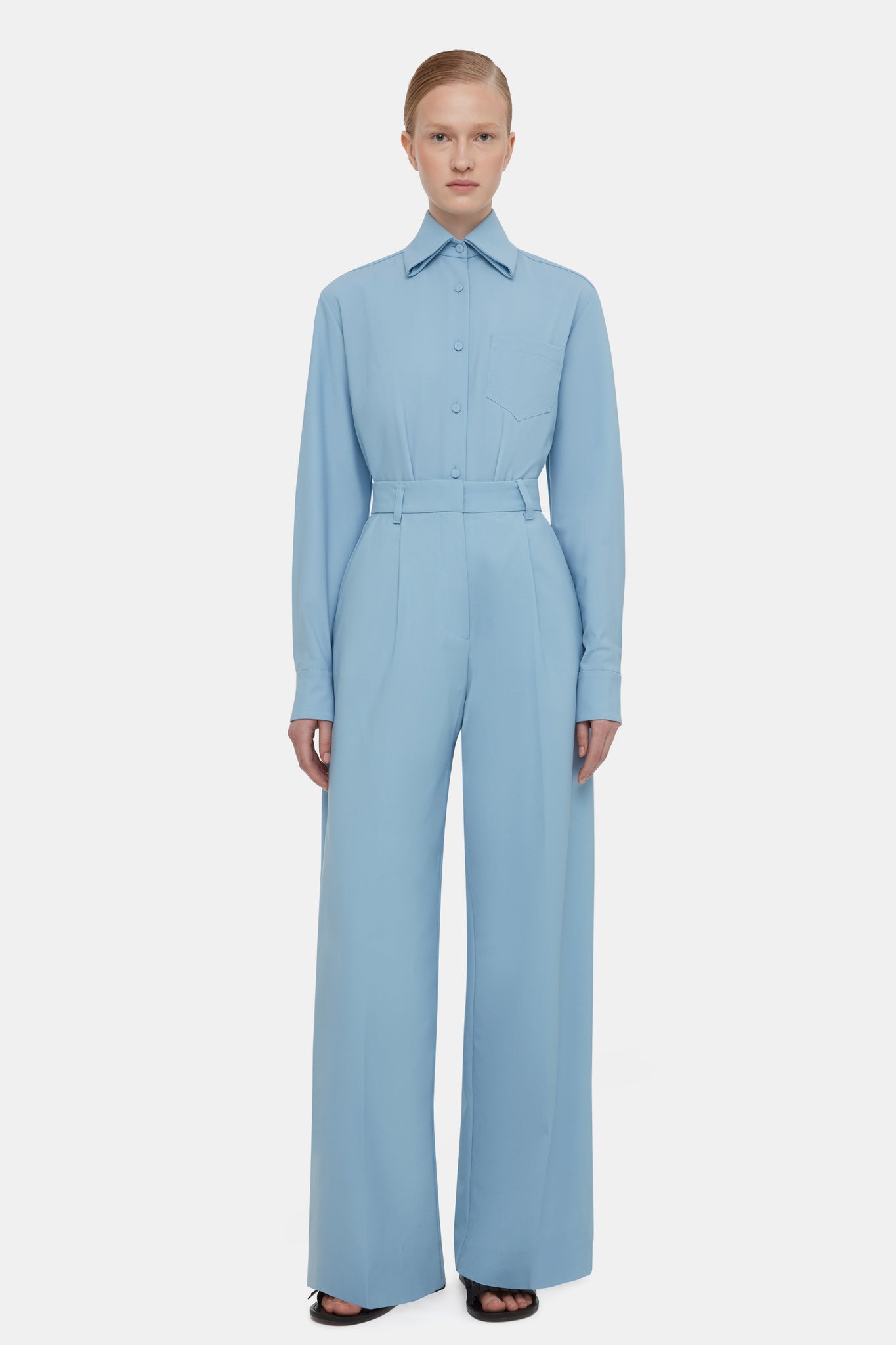 Model wears  Patricia Top In Duck Egg Blue Summer Wool & Audrey Trousers In Duck Egg Blue Summer Wool | Emilia Wickstead