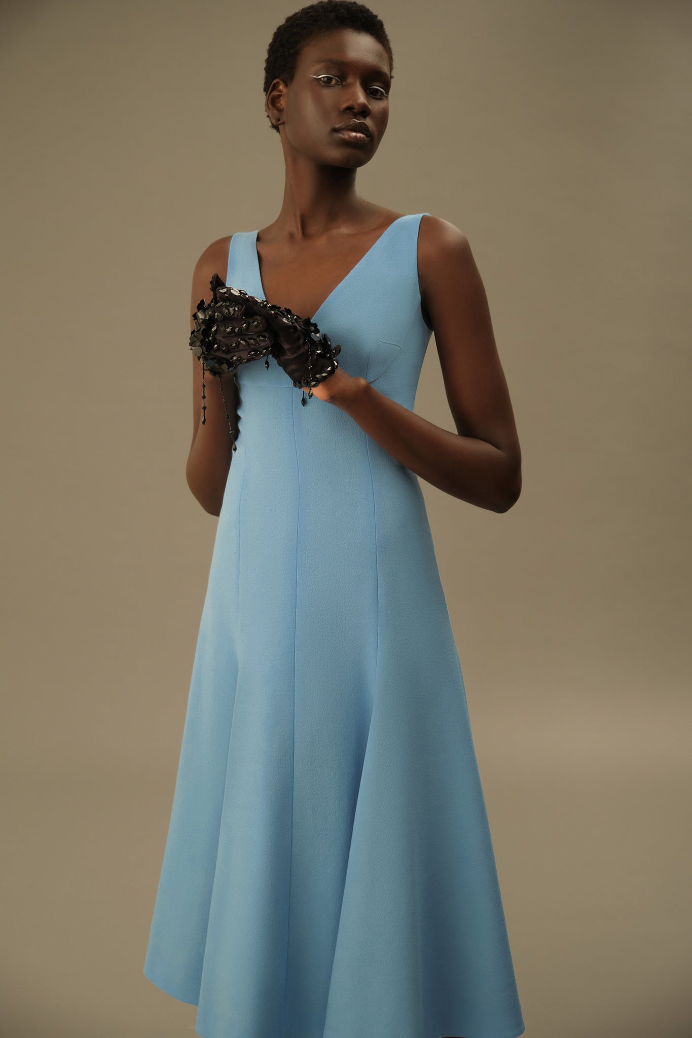 Model wearing the Emilia Wickstead Geneve Dress in sky blue