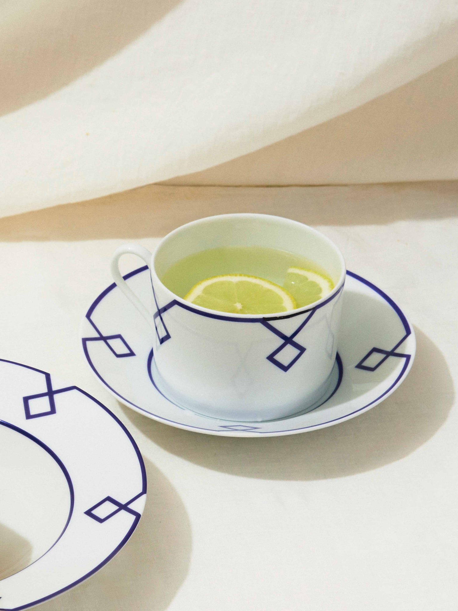 Naples Tea Cup and Saucer with Navy Geometric Border